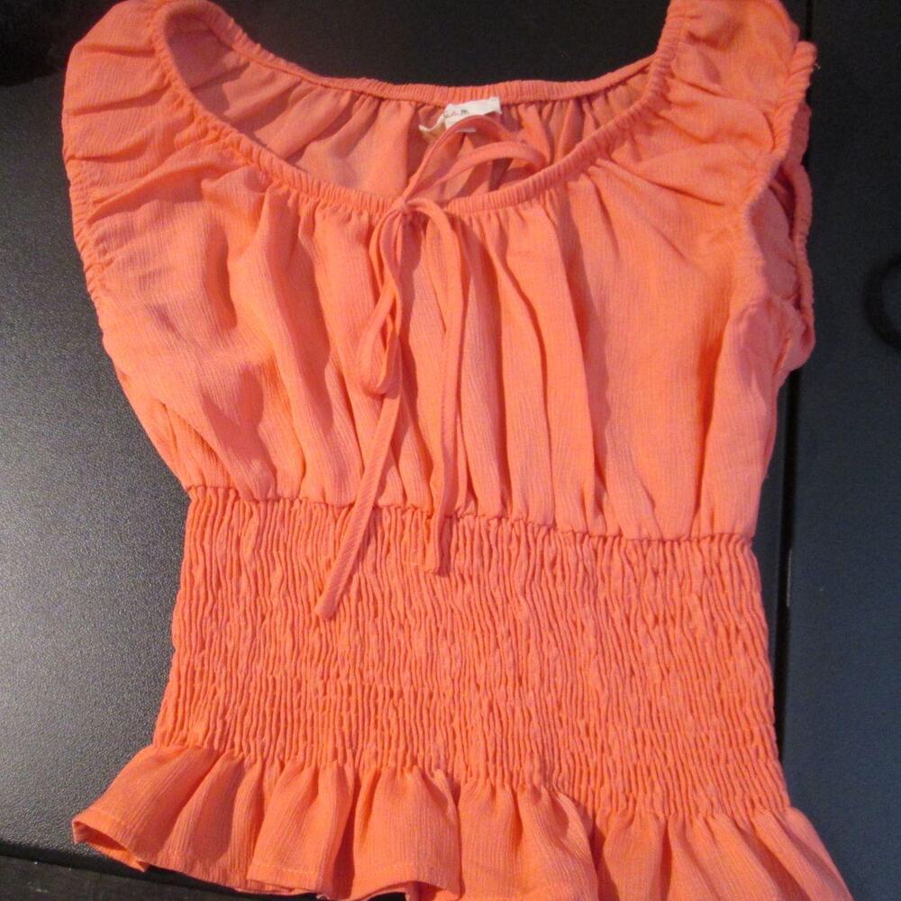 Juniors sz s peach colored shirt by E AND M